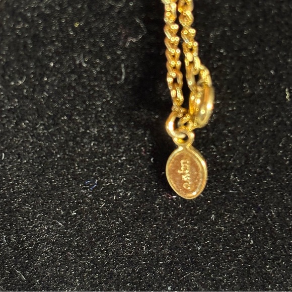 Avon bezeled rhinestone gold toned necklace. 4 stones. Stamped “Avon”. 18” - Picture 2 of 4